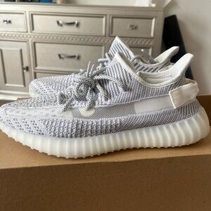 Brand new never worn Yeezys men 9 1/2 and women’s 11 1/2